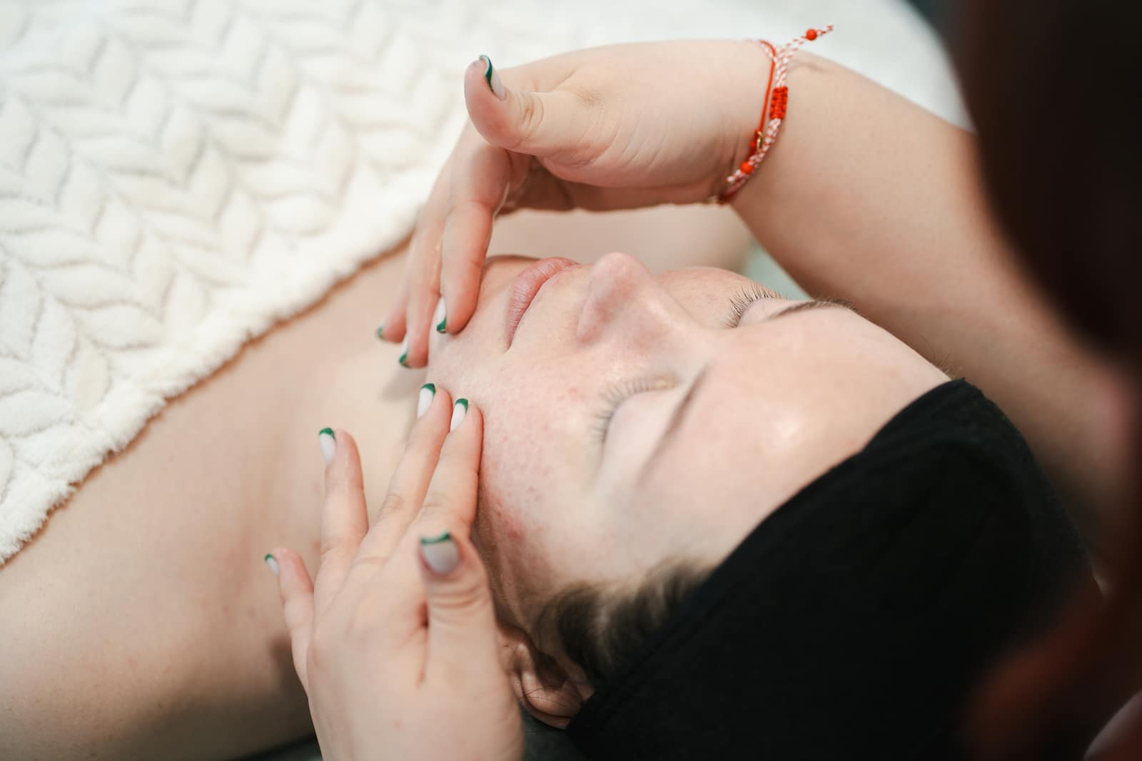 Patient during a facial treatment